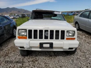 2000 Jeep Cherokee Classic с VIN 1J4FF58S7YL133399, выставлен на аукционе Copart как лот 61231845 с пробегом 196 499 миль миль и Списание • Salvage title. История ставок и продаж доступна на DreamBid. Изображение 5.