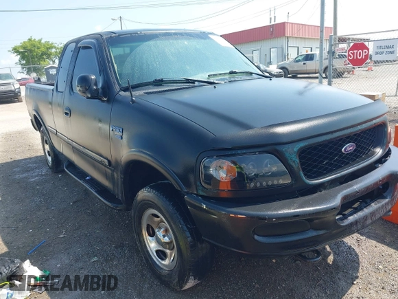 1998 Ford F-150 with VIN 1FTRX18L2WKA67414, listed as a IAAI auction lot 42583873 with 189,546 mi miles and . Bid and sale history available at DreamBid. Image 1.