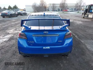 2017 Subaru WRX Limited z VIN JF1VA1N66H8803839, wystawiony jako IAAI lot #40997240 z przebiegiem 102 595 mil mil oraz . Historia ofert i sprzedaży dostępna na DreamBid. Obrazek 16.