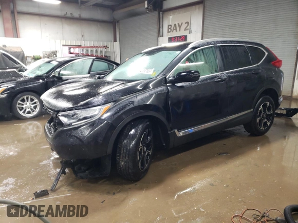 2017 Honda CR-V Touring with VIN 2HKRW2H91HH608340, listed as a Copart auction lot 43997625 with 58,446 mi miles and Salvage Title. Bid and sale history available at DreamBid. Image 1.