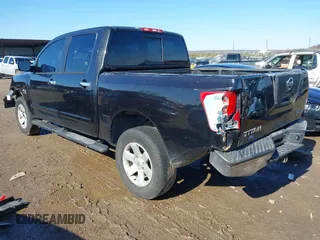 2004 Nissan Titan LE with VIN 1N6AA07A44N591357, listed as a IAAI auction lot 41464024 with 296,954 mi miles and . Bid and sale history available at DreamBid. Image 3.