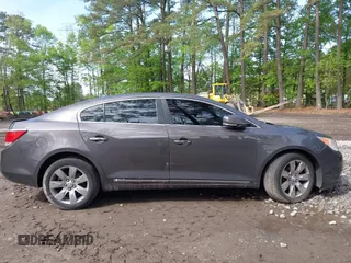 2012 Buick LaCrosse Premium 3 z VIN 1G4GH5E31CF310937, wystawiony jako IAAI lot #42092530 z przebiegiem 165 295 mil mil oraz . Historia ofert i sprzedaży dostępna na DreamBid. Obrazek 13.