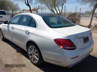 2019 Mercedes-Benz E-Class E 300 with VIN WDDZF4JBXKA597397, listed as a IAAI auction lot 41724672 with 99,258 mi miles. Bid and sale history available at carsss.com. Image 3.