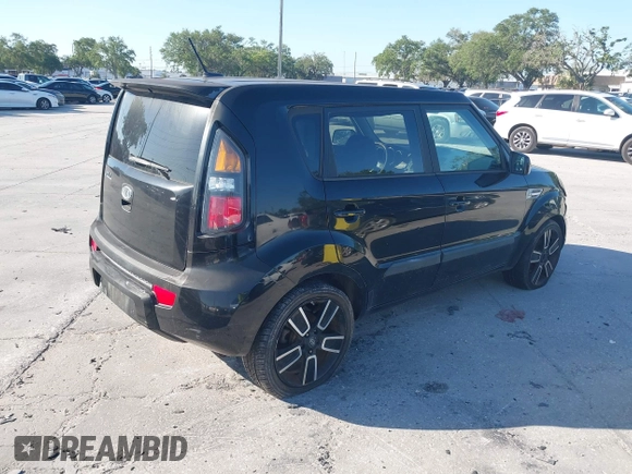 2011 Kia Soul + with VIN KNDJT2A22B7282062, listed as a IAAI auction lot 42035564 with 201,870 mi miles. Bid and sale history available at carsss.com. Image 4.