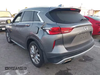 2021 Infiniti QX50 Luxe with VIN 3PCAJ5BA9MF124179, listed as a IAAI auction lot 42296244 with 79,935 mi miles and . Bid and sale history available at DreamBid. Image 3.