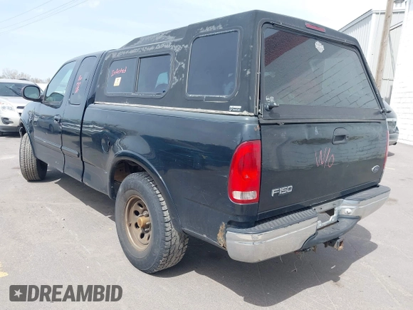 1999 Ford F-150 XL with VIN 1FTRX18L8XNB25526, listed as a IAAI auction lot 41970764 with 1 mi miles. Bid and sale history available at carsss.com. Image 3.
