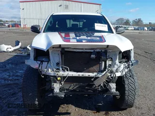 2020 Toyota Tacoma SR5 with VIN 3TMAZ5CN4LM132002, listed as a IAAI auction lot 41224844 with 55,000 mi miles and . Bid and sale history available at DreamBid. Image 13.
