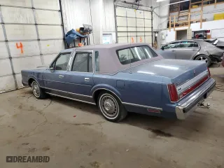 1988 Lincoln Town Car with VIN 1LNBM81F2JY754921, listed as a Copart auction lot 76236564 with 593,215 mi miles and Salvage Title. Bid and sale history available at carsss.com. Image 2.