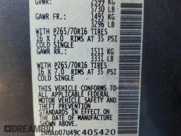 2009 Nissan Frontier SE with VIN 1N6AD07U49C405420, listed as a Copart auction lot 41983545 with 203,700 mi miles and Salvage title. Bid and sale history available at DreamBid. Image 14.