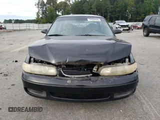 1996 Mazda 626 z VIN 1YVGE22C2T5585359, wystawiony jako Copart lot #74568444 z przebiegiem 159 922 mil mil oraz Szkody całkowita. Historia ofert i sprzedaży dostępna na DreamBid. Obrazek 5.