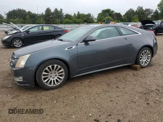 2011 Cadillac CTS Performance z VIN 1G6DK1ED5B0100033, wystawiony jako Copart lot #57621415 z przebiegiem 63 770 mil mil oraz Szkoda całkowita • Salvage title. Historia ofert i sprzedaży dostępna na DreamBid. Obrazek 1.