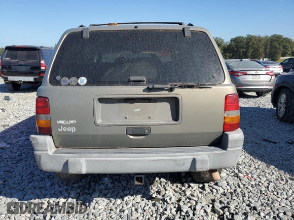 1998 Jeep Grand Cherokee Laredo with VIN 1J4FX58S7WC179728, listed as a Copart auction lot 77372224 with 0 mi miles and Clean Title. Bid and sale history available at carsss.com. Image 6.