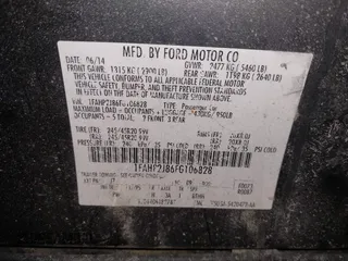 2015 Ford Taurus Limited with VIN 1FAHP2J86FG106828, listed as a IAAI auction lot 41748997 with 221,216 mi miles. Bid and sale history available at carsss.com. Image 9.