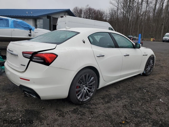 2023 Maserati Ghibli Modena Q4 with VIN ZAM57YTM5PX419828, listed as a Copart auction lot 48573354 with 12,261 mi miles. Bid and sale history available at carsss.com. Image 3.