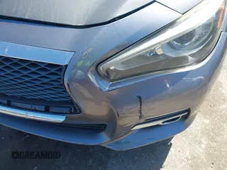 2014 Infiniti Q50 Sport with VIN JN1BV7AR4EM689009, listed as a IAAI auction lot 41990992 with 131,071 mi miles and . Bid and sale history available at DreamBid. Image 6.