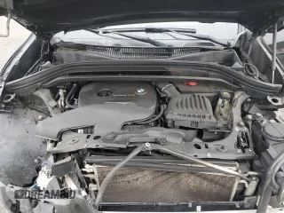 2018 BMW X1 xDrive28i with VIN WBXHT3C31J5F89068, listed as a Copart auction lot 52266655 with 145,375 mi miles and Clean Title. Bid and sale history available at carsss.com. Image 12.
