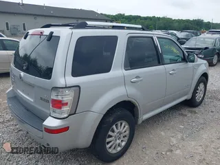 2008 Mercury Mariner Premier with VIN 4M2CU87108KJ01466, listed as a IAAI auction lot 42634600 with 95,436 mi miles and . Bid and sale history available at DreamBid. Image 4.