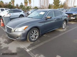 2013 Infiniti M37 with VIN JN1BY1AP8DM513615, listed as a IAAI auction lot 41572602 with 96,950 mi miles. Bid and sale history available at carsss.com. Image 2.