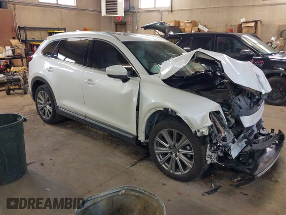 2021 Mazda CX-9 Signature with VIN JM3TCBEY3M0509978, listed as a IAAI auction lot 41690773 with 65,418 mi miles. Bid and sale history available at carsss.com. Image 1.