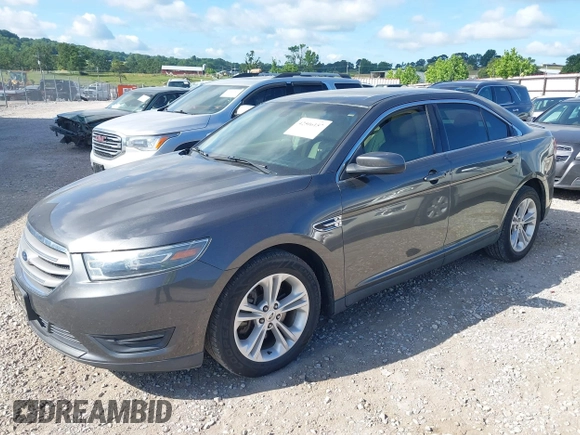2015 Ford Taurus SEL with VIN 1FAHP2E87FG156969, listed as a IAAI auction lot 42506157 with 99,184 mi miles and . Bid and sale history available at DreamBid. Image 2.