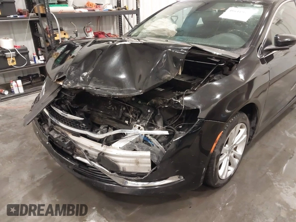 2015 Chrysler 200 Limited with VIN 1C3CCCAB1FN612164, listed as a IAAI auction lot 41641912 with 166,116 mi miles. Bid and sale history available at carsss.com. Image 6.