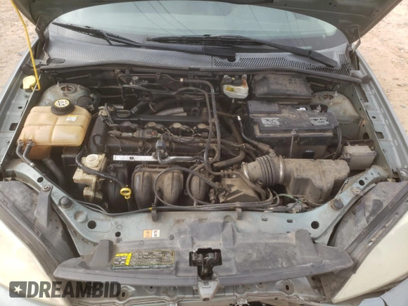 2006 Ford Focus S with VIN 1FAHP37N76W180039, listed as a Copart auction lot 58328565 with 220,696 mi miles and Salvage title. Bid and sale history available at DreamBid. Image 12.