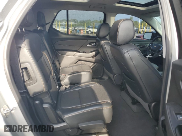 2018 Chevrolet Traverse Premier z VIN 1GNEVJKWXJJ280737, wystawiony jako Copart lot #55680005 z przebiegiem 83 098 mil mil oraz Szkoda całkowita • Salvage title. Historia ofert i sprzedaży dostępna na DreamBid. Obrazek 11.