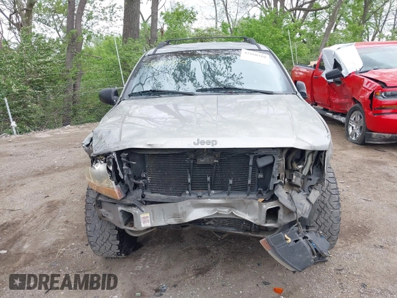 2001 Jeep Grand Cherokee Laredo z VIN 1J4GW48S01C658017, wystawiony jako IAAI lot #42160310 z przebiegiem 220 309 mil mil oraz . Historia ofert i sprzedaży dostępna na DreamBid. Obrazek 13.