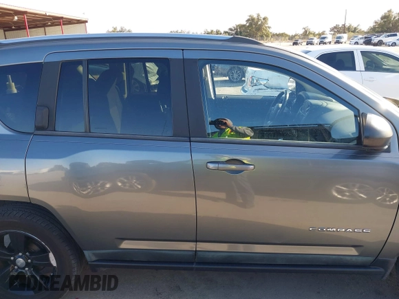 2011 Jeep Compass with VIN 1J4NT1FA0BD246586, listed as a IAAI auction lot 41253630 with 120,540 mi miles. Bid and sale history available at carsss.com. Image 13.