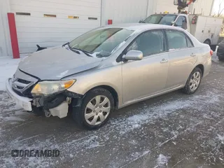 2012 Toyota Corolla L with VIN JTDBU4EE7C9171949, listed as a IAAI auction lot 41401510 with 161,944 mi miles. Bid and sale history available at carsss.com. Image 2.