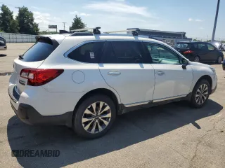2019 Subaru Outback Touring with VIN 4S4BSATC7K3221137, listed as a Copart auction lot 66643915 with 173,317 mi miles and Salvage title. Bid and sale history available at DreamBid. Image 3.
