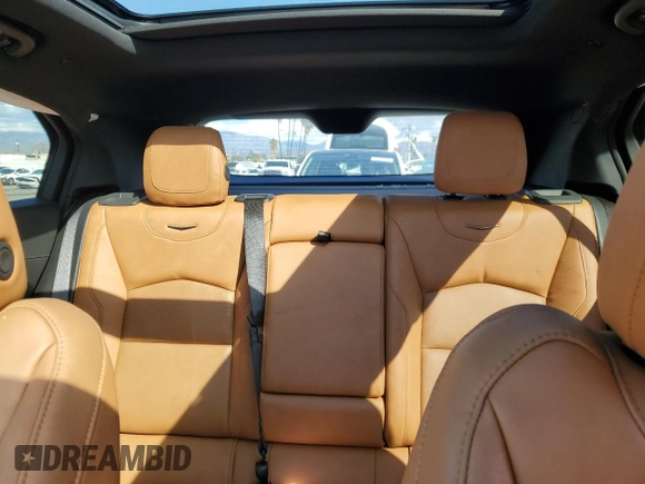 2023 Cadillac XT4 AWD Premium Luxury z VIN 1GYFZDR44PF206176, wystawiony jako Copart lot #46456445 z przebiegiem 3 896 mil mil oraz Szkoda całkowita • Salvage title. Historia ofert i sprzedaży dostępna na DreamBid. Obrazek 10.