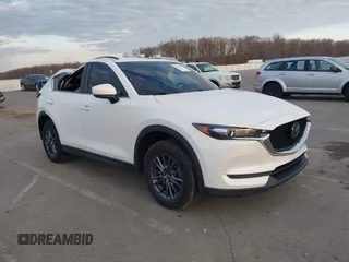 2019 Mazda CX-5 Sport with VIN JM3KFABMXK1655302, listed as a IAAI auction lot 41901293 with 140,369 mi miles and . Bid and sale history available at DreamBid. Image 1.