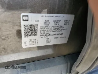 2021 Chevrolet Tahoe LT z VIN 1GNSKNKD2MR357415, wystawiony jako Copart lot #65203165 z przebiegiem 82 996 mil mil oraz Szkoda całkowita • Salvage title. Historia ofert i sprzedaży dostępna na DreamBid. Obrazek 14.