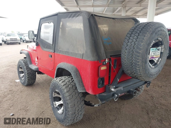 1994 Jeep Wrangler with VIN 1J4FY29S1RP437913, listed as a IAAI auction lot 42185965 with 245,618 mi miles and . Bid and sale history available at DreamBid. Image 3.