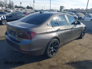 2014 BMW 3 Series 328i with VIN WBA3A5C56EP603819, listed as a IAAI auction lot 41217764 with 156,140 mi miles and . Bid and sale history available at carsss.com. Image 4.