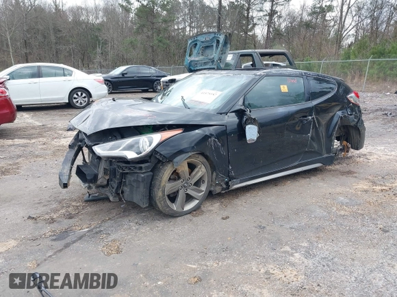 2013 Hyundai Veloster Turbo z VIN KMHTC6AE3DU100962, wystawiony jako IAAI lot #41575187 z przebiegiem Nie podano mil oraz . Historia ofert i sprzedaży dostępna na DreamBid. Obrazek 2.