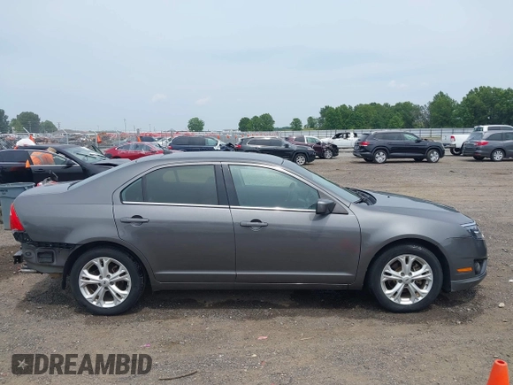 2012 Ford Fusion SE with VIN 3FAHP0HA9CR141588, listed as a IAAI auction lot 42485632 with 124,312 mi miles and . Bid and sale history available at DreamBid. Image 13.