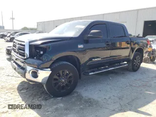 2012 Toyota Tundra with VIN 5TFEY5F12CX129655, listed as a Copart auction lot 60914975 with 212,491 mi miles and Salvage title. Bid and sale history available at DreamBid. Image 1.