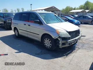 2009 Honda Odyssey LX with VIN 5FNRL38219B044433, listed as a IAAI auction lot 42005567 with 148,883 mi miles and . Bid and sale history available at DreamBid. Image 1.