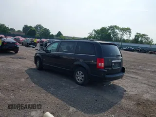 2008 Chrysler Town & Country Touring z VIN 2A8HR54P48R765302, wystawiony jako IAAI lot #42487816 z przebiegiem 128 761 mil mil oraz . Historia ofert i sprzedaży dostępna na DreamBid. Obrazek 3.