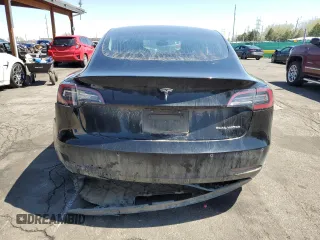 2019 Tesla Model 3 Long Range with VIN 5YJ3E1EB8KF451535, listed as a Copart auction lot 53085105 with 133,928 mi miles and Non Repairable. Bid and sale history available at DreamBid. Image 6.