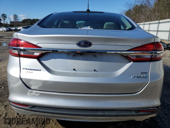 2018 Ford Fusion SE z VIN 3FA6P0LU9JR208728, wystawiony jako Copart lot #43519495 z przebiegiem 183 976 mil mil oraz Czysty tytuł • Clean title. Historia ofert i sprzedaży dostępna na DreamBid. Obrazek 6.