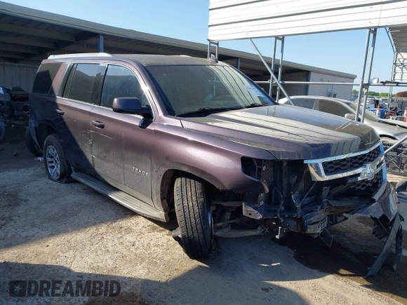 2015 Chevrolet Tahoe LS with VIN 1GNSCAKCXFR628303, listed as a IAAI auction lot 42002698 with 152,141 mi miles and . Bid and sale history available at DreamBid. Image 1.