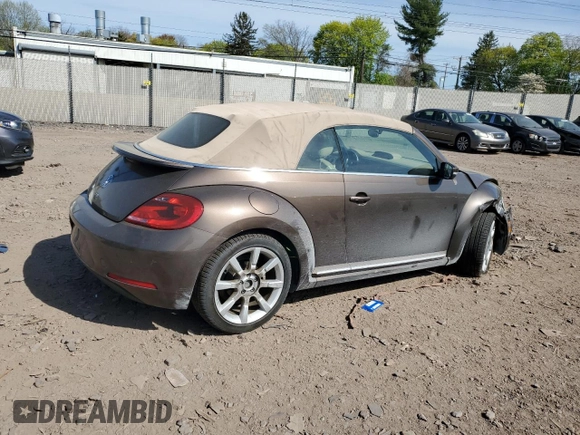 2014 Volkswagen Beetle 2.0L TDI с VIN 3VW6L7ATXEM809087, выставлен на аукционе Copart как лот 53710365 с пробегом Не указан миль и Списание • Salvage title. История ставок и продаж доступна на DreamBid. Изображение 3.