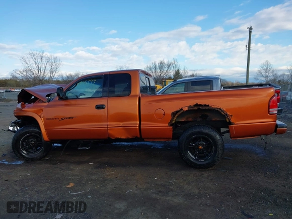2000 Dodge Dakota SLT with VIN 1B7GG22XXYS610262, listed as a IAAI auction lot 41806744 with 243,650 mi miles and . Bid and sale history available at carsss.com. Image 14.