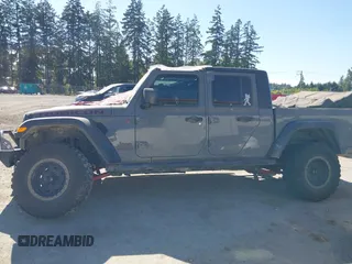 2023 Jeep Gladiator Rubicon with VIN 1C6JJTBG6PL538859, listed as a IAAI auction lot 42633055 with 22,899 mi miles and . Bid and sale history available at DreamBid. Image 15.