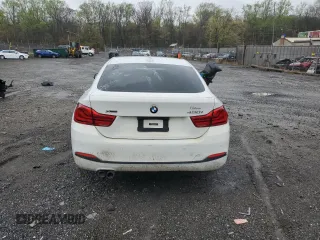 2019 BMW 4 Series 430i xDrive with VIN WBA4J3C55KBL04971, listed as a Copart auction lot 52088445 with 112,353 mi miles and Clean Title. Bid and sale history available at carsss.com. Image 6.