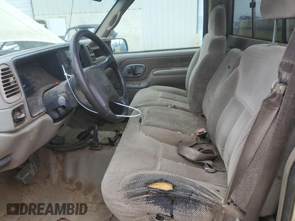 1997 GMC Sierra 1500 with VIN 1GTGC24R4VZ546832, listed as a Copart auction lot 87954535 with 411,941 mi miles and Clean Title. Bid and sale history available at DreamBid. Image 7.