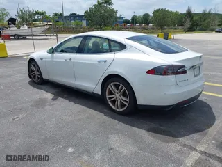2013 Tesla Model S with VIN 5YJSA1CN2DFP17316, listed as a IAAI auction lot 42092751 with 1 mi miles. Bid and sale history available at carsss.com. Image 3.